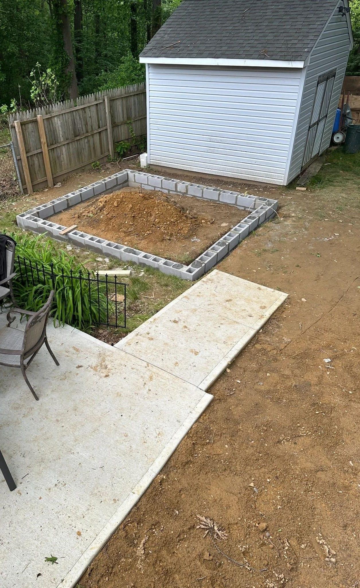 Block foundation laid for custom pool house and outdoor bar