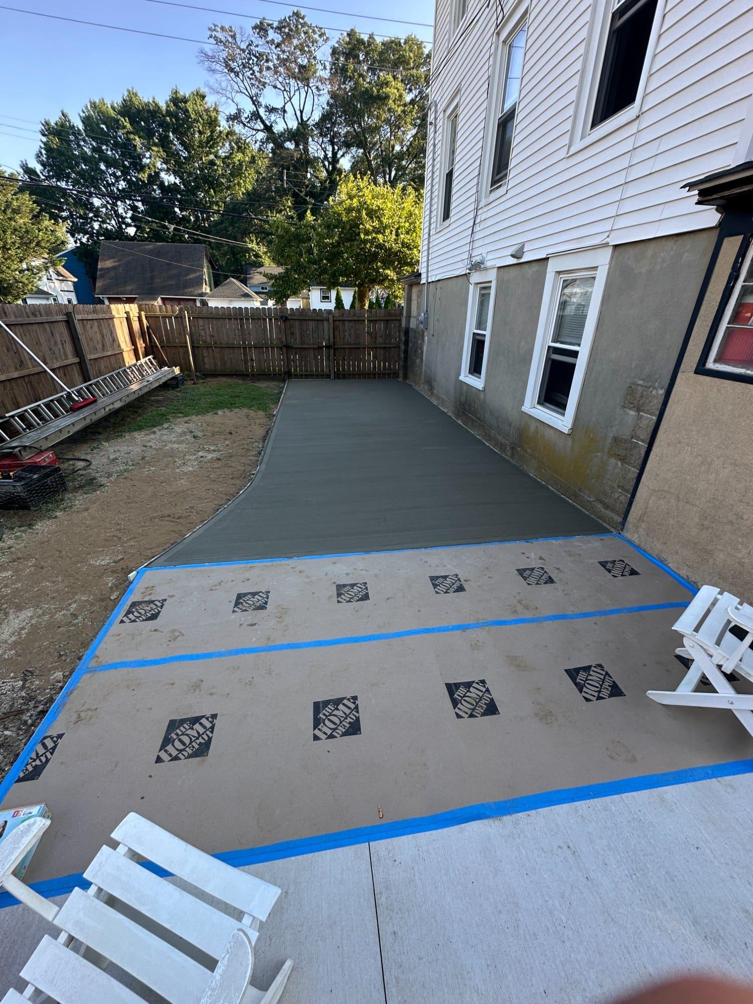 New concrete patio poured in Central NJ backyard