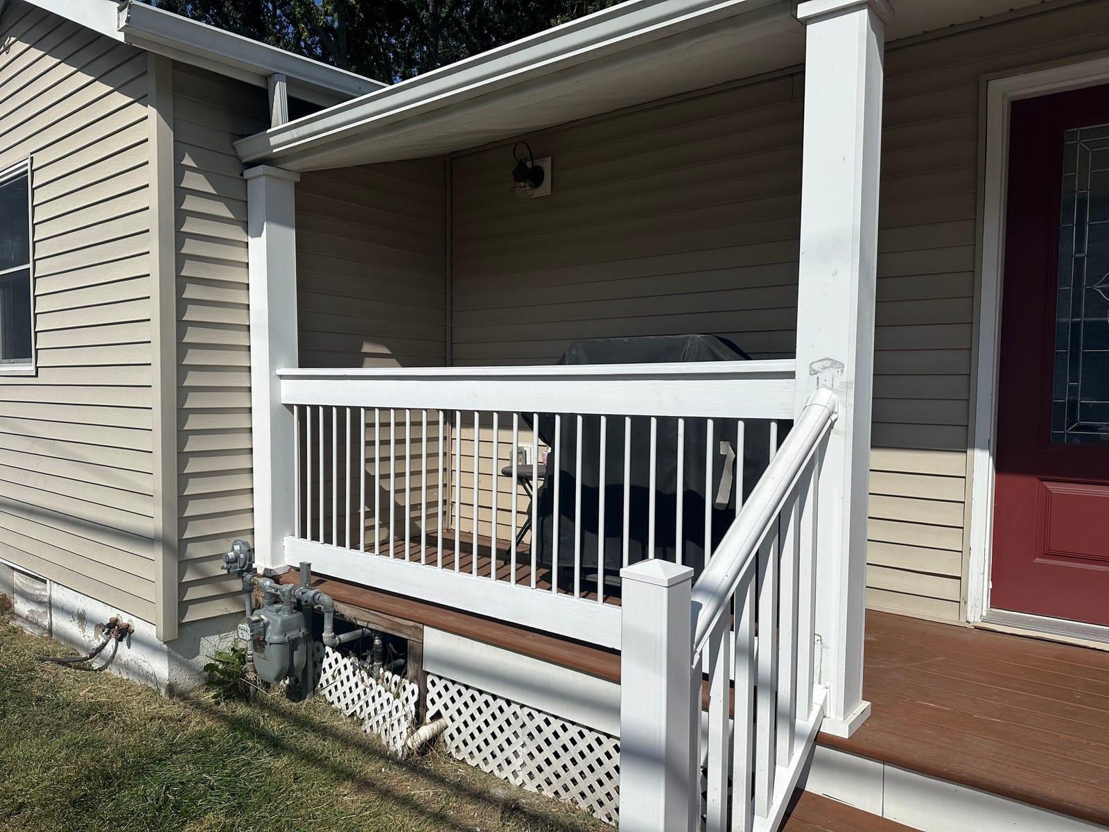 Finished porch railing painted white at front entry, Monmouth County NJ